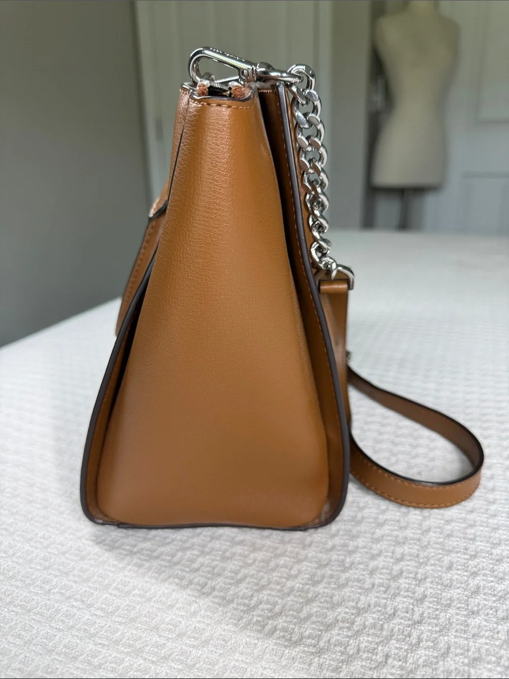 Michael Kors saddle tan saffiano leather satchel with silver hardware